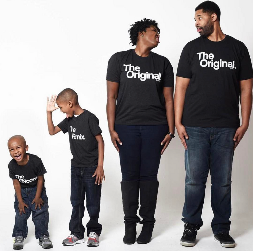 family of four posing with goofy faces and body language behind a white back drop for a cute family photo moment